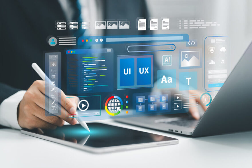 Web UI-UX design, web development concept. A web developer works on a website, surrounded by holographic displays of code, icons, and data visualizations. Web design, application design, coding. UX web design Steel Blue Media